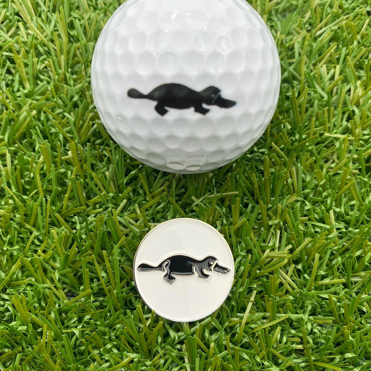 White circle Platypus magnetic golf ball marker
